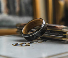Load image into Gallery viewer, Mens Wedding band featuring Whisky Oak, Ebony with Offset Silver Inlay.