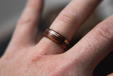 Mens wedding band made from santos rosewood with Double Offset Copper.