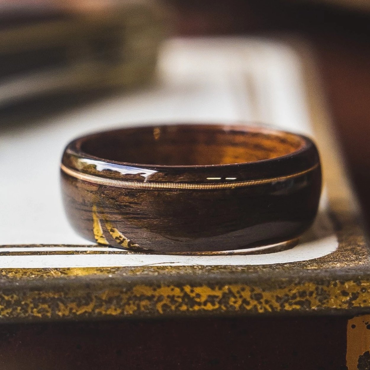 Mens Wedding band featuring Mahogany, Ebony, Guitar string inlay.